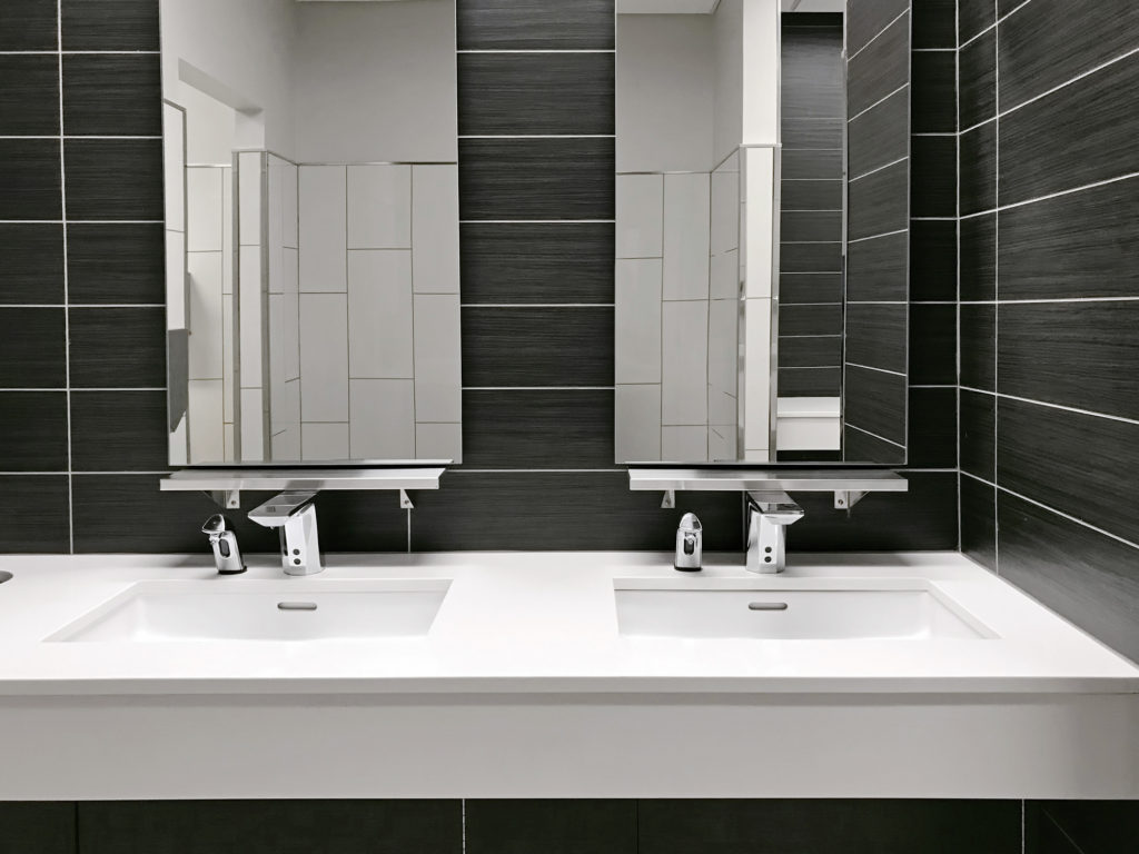 2 bathroom sinks with automatic sensors